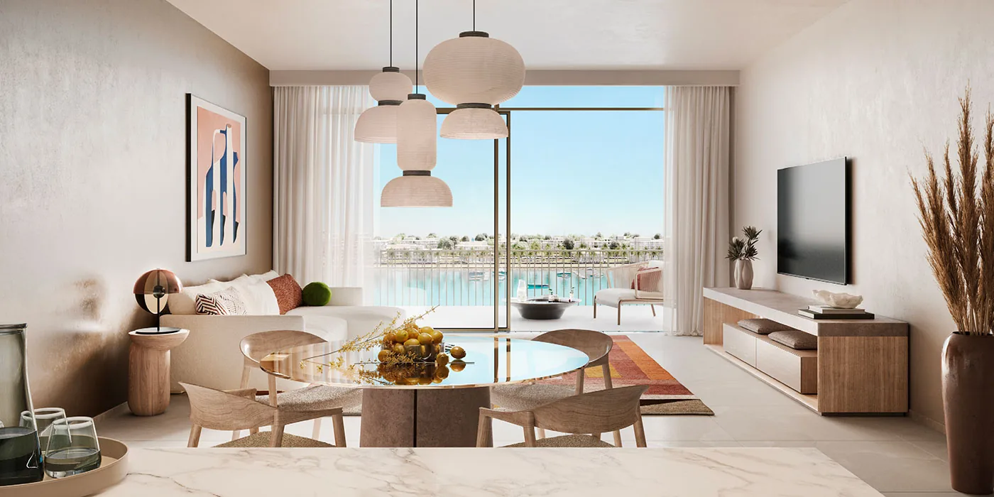 Bay Estate living and dining area with marina view